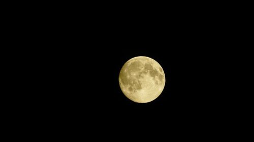 Low angle view of moon in sky