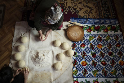 High angle view of woman preparing food at home