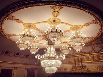 Low angle view of illuminated chandelier