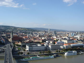 High angle view of river amidst buildings in city