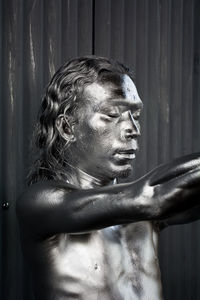 Close-up of shirtless man