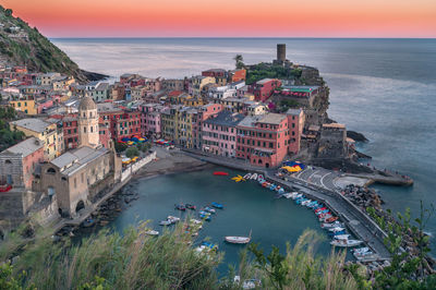 High angle view of townscape by sea