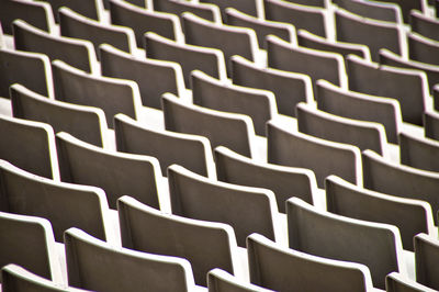 Full frame shot of empty chairs in stadium