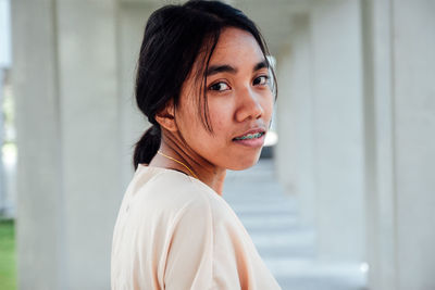 Young woman looking away