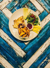 High angle view of food served on table