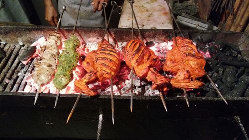 Close-up of meat on barbecue grill