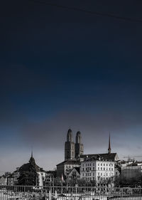 Buildings in city against sky