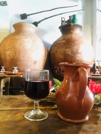 Close-up of wine bottles on table