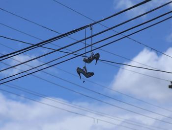 High heels tossed over power cables 