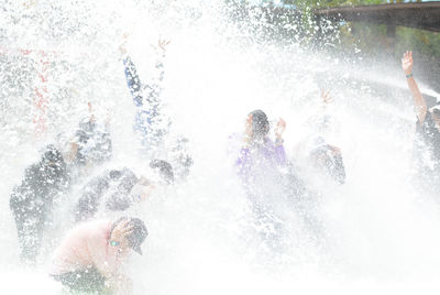 People enjoying in sea