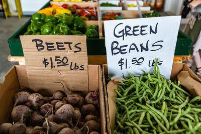 Various vegetables for sale at market stall