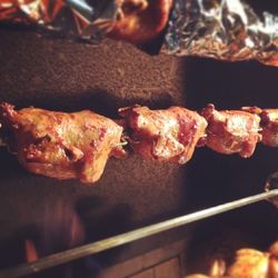 Close-up of meat on barbecue grill