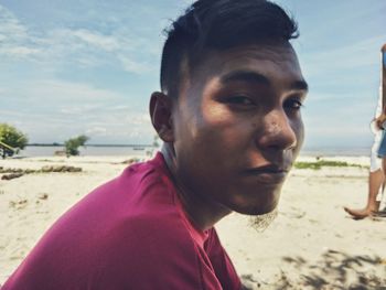 Portrait of man on beach