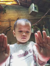 Portrait of cute girl holding hands