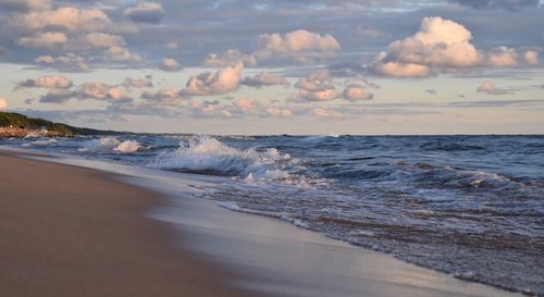 Scenic view of sea against sky at sunset