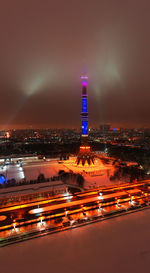 Illuminated buildings in city at night