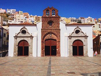 Facade of church against blue sky