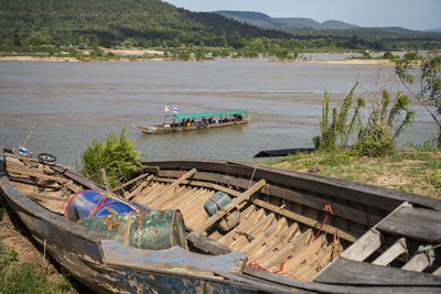 Boats moored at harbor