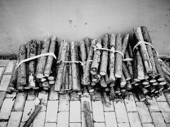 Stack of firewood against wall