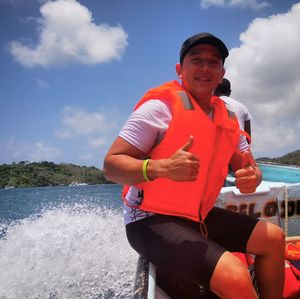 Full length of man standing by sea against sky