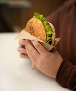 Close-up of hand holding food