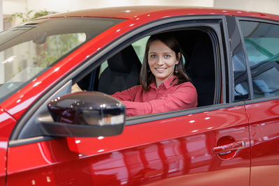 Portrait of woman in car