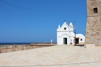 View of building against blue sky. sancruary of capocolonna,calabria,italy. photo by canon eos 650 d