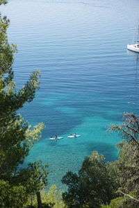 High angle view of sea against blue sky