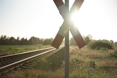 Close-up of railroad track against clear sky