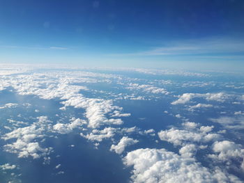 Aerial view of clouds over blue sky