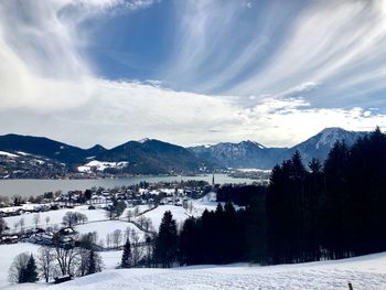 Scenic view of snow covered mountains against sky