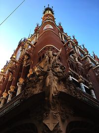 Low angle view of statue against sky