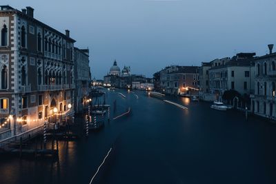 Grand canal amidst buildings at dusk