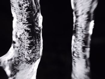 Close-up of ice over black background