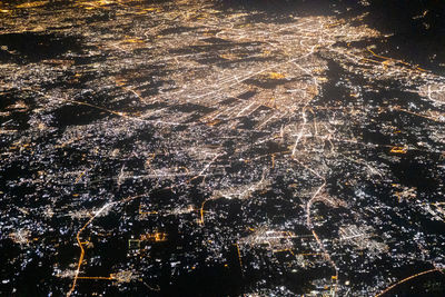 High angle view of illuminated cityscape