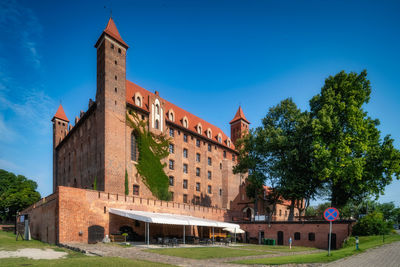 Low angle view of historic building against sky