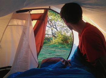 Man sitting in tent