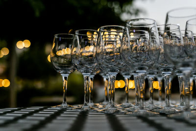 Luxury table settings for fine dining with and glassware, pouring wine to glass.beautiful background