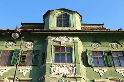 Low angle view of historic building against clear sky