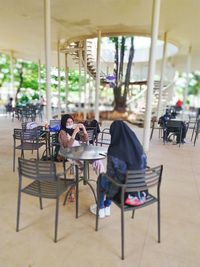 People sitting on table in cafe