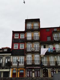 Low angle view of residential building against sky