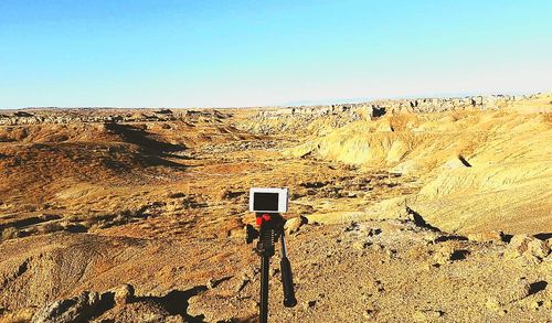 View of desert against clear sky