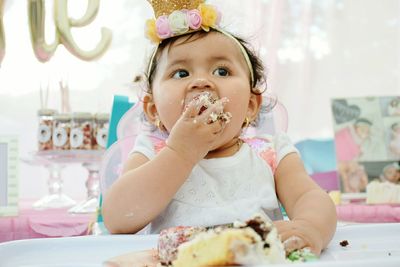 Portrait of cute girl eating