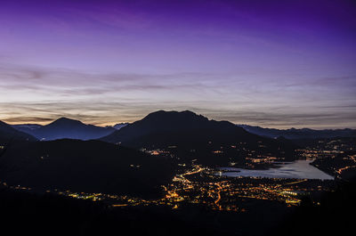 Scenic view of mountains against sky at sunset