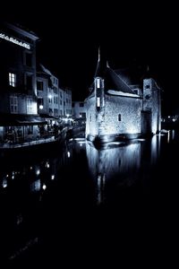 View of illuminated buildings at night