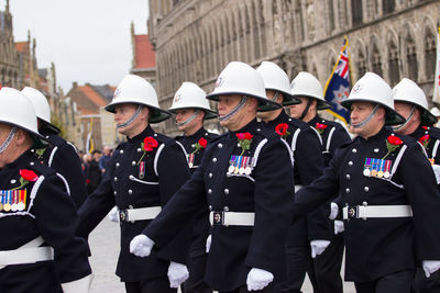 Group of people in front of buildings