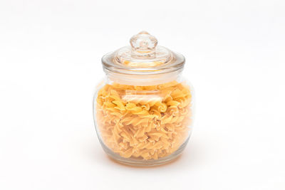 High angle view of glass jar against white background