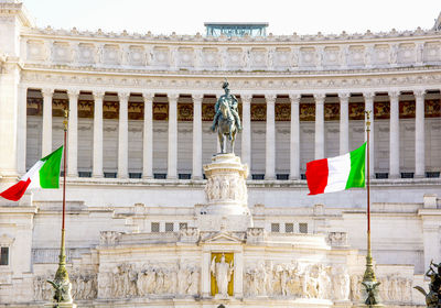 Altare della patria famous monument with the italian flag in rome