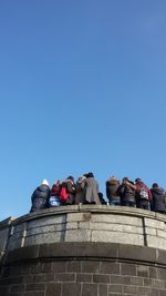 Low angle view of built structure against blue sky