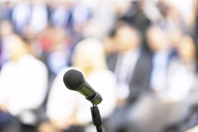 Business conference event, corporate presentation or workshop, microphone in the focus